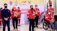 Zainudin Amali saat memberi sambutan dalam penyambutan kepulangan kloter terakhir Kontingen Indonesia untuk Paralimpiade Tokyo di Bandar Udara Soekarno-Hatta