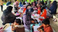 Hujan Tak Halangi Semangat Puluhan Anak Ikuti Lomba Mewarnai HUT ke-7 AJI Tanjungpinang